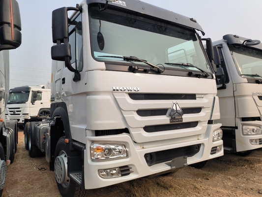 Подержанный Sinotruk HOWO 6X4 Heavy Duty Trailer Head Тракторный грузовик с и ≤5 сиденьями