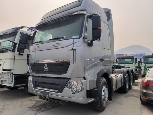 Подержанный Sinotruk HOWO Трактор прицепная головка 6X4 Тракторный грузовик с коробкой передач Hw19710
