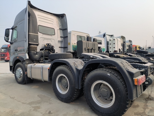 Подержанный Sinotruk HOWO Трактор прицепная головка 6X4 Тракторный грузовик с коробкой передач Hw19710