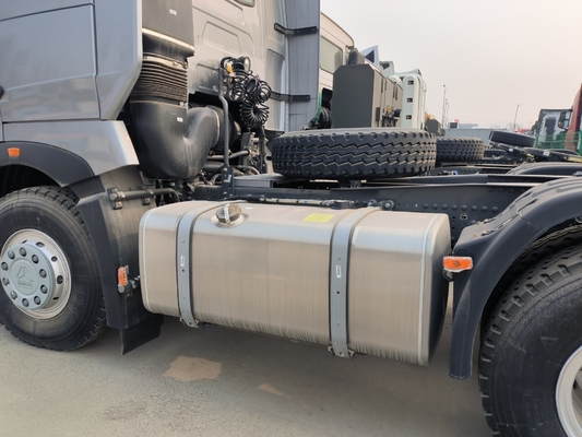 Подержанный Sinotruk HOWO Трактор прицепная головка 6X4 Тракторный грузовик с коробкой передач Hw19710