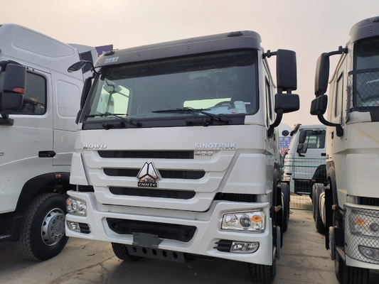 Подержанный Sinotruk HOWO Трактор прицепная головка 6X4 Тракторный грузовик с коробкой передач Hw19710