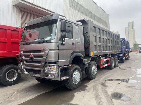 Подержанный Sinotruk 8X4 12 колес 50 тонн HOWO свертывающий грузовик с передним гидравлическим подъемом