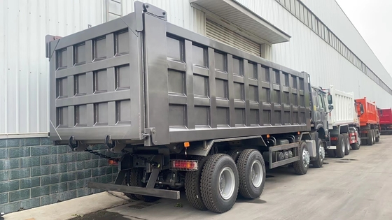 Подержанный Sinotruk 8X4 12 колес 50 тонн HOWO свертывающий грузовик с передним гидравлическим подъемом