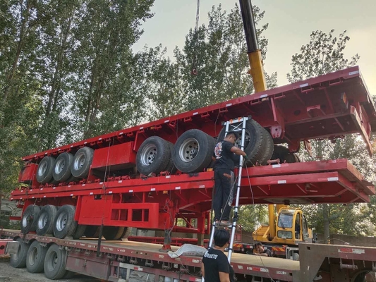 Транспортировка облегчена трехосновым плоским полуприцепом и шинами 315/80r22.5